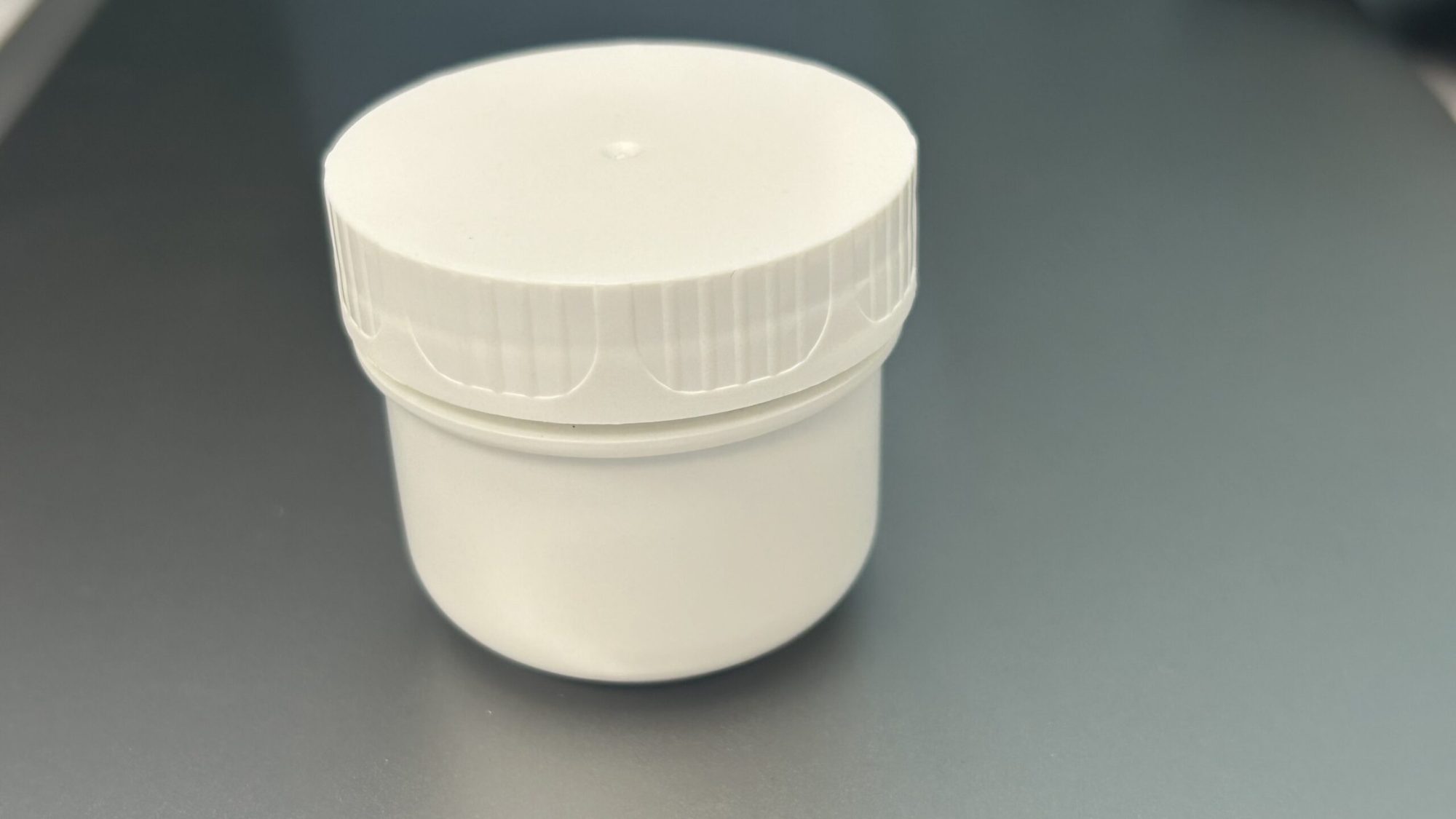 How can glass be replaced with a sustainable high-barrier bottle?